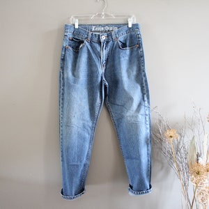 Vintage Levis 524 Jeans: Stonewashed Medium Blue, Button Fly (33x32)