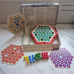 May include: A rustic wooden sign with the text "Welcome to our home" in white lettering. The sign features a distressed finish and a simple, inviting design, perfect for front door decor.