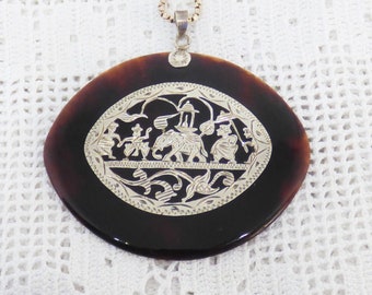 Vintage Far Eastern Eye Shaped Faux Tortoise Shell Pendant Real Pierced Silver Decoration Of Elephant With Statue On His Back In A Parade