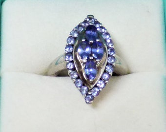 Solid Silver Lilac Blue Simulated Tanzanite Marquise Shaped Ring Centre Having 4 Marquise Shape Stones Surounded By Smaller Ones Circa 1990s