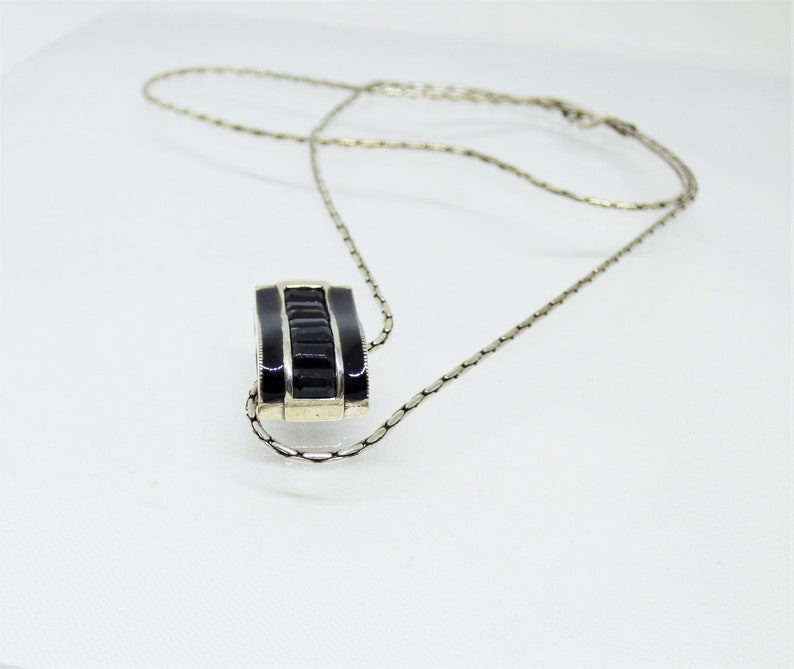 Vintage Solid Silver Curved Oblong Shaped Pendant With 7 Black Baguette Down The Centre Flanked By Black Enamel Art Deco Revival C1970-1980s