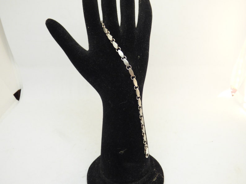 Vintage 1970/'s Solid Silver Bracelet One Side Having An Oval Pattern And The Other Having A Cross Shaped Pattern