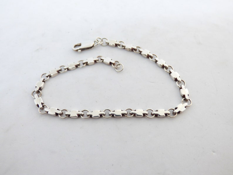 Vintage 1970/'s Solid Silver Bracelet One Side Having An Oval Pattern And The Other Having A Cross Shaped Pattern