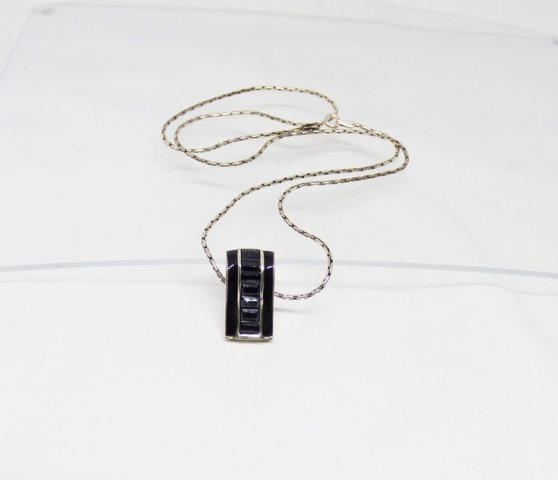 Vintage Solid Silver Curved Oblong Shaped Pendant With 7 Black Baguette Down The Centre Flanked By Black Enamel Art Deco Revival C1970-1980s