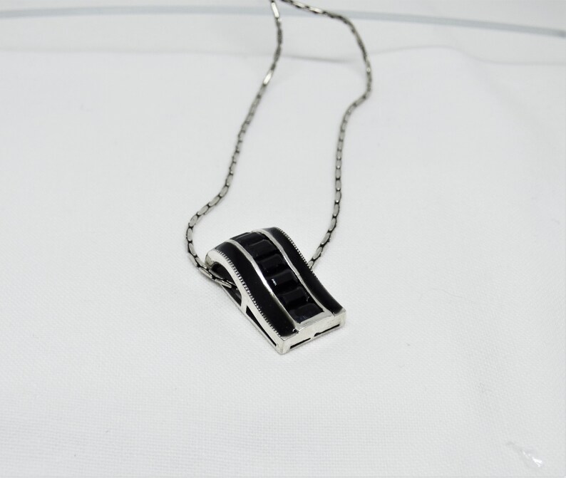 Vintage Solid Silver Curved Oblong Shaped Pendant With 7 Black Baguette Down The Centre Flanked By Black Enamel Art Deco Revival C1970-1980s