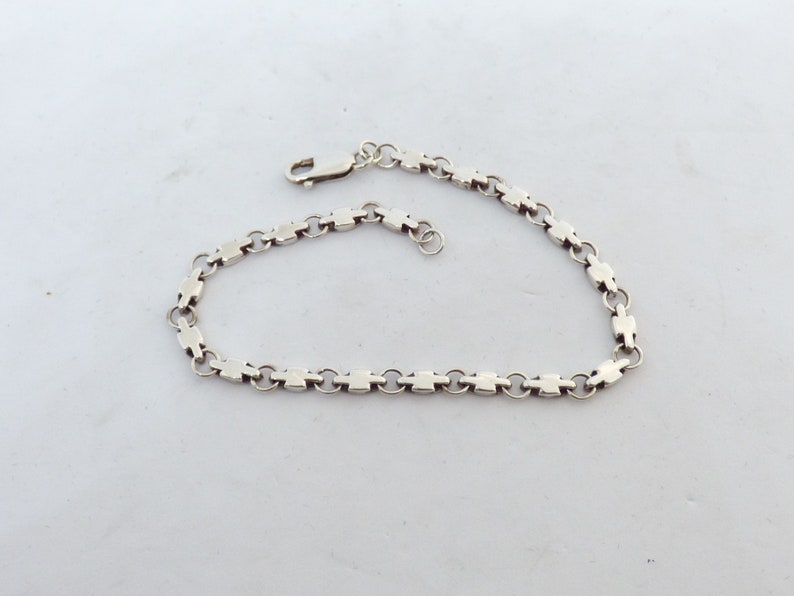 Vintage 1970/'s Solid Silver Bracelet One Side Having An Oval Pattern And The Other Having A Cross Shaped Pattern