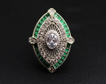 An Impressive Art Deco Revival Large Marquise Shaped Solid Silver Ring Set With Paste Diamonds & Paste Emeralds Circa 2000