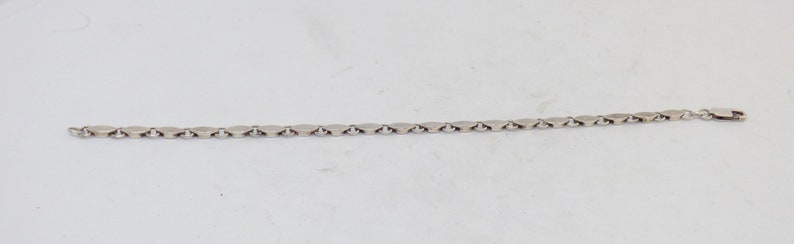 Vintage 1970/'s Solid Silver Bracelet One Side Having An Oval Pattern And The Other Having A Cross Shaped Pattern