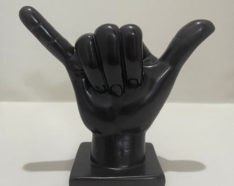 Shaka-handen! - Håll dig lös! - Mahalo-handen! - Surfar upp!