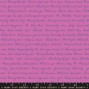 May include: A fabric with a pink background and blue cursive text. The text includes phrases like "Love you," "Many thanks," and "Warm regards." The bottom of the fabric has a black ruler with the words "RUBY STAR SOCIETY."