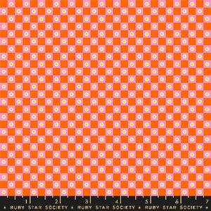 May include: A colourful fabric featuring a repeating pattern of orange and pink squares, each with a small yellow flower. The fabric has a checkered design. The text "RUBY STAR SOCIETY" is at the bottom.