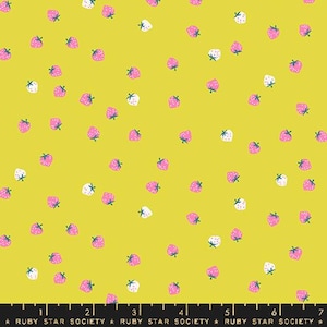 May include: A fabric with a bright yellow background, scattered with small, stylized strawberries. The strawberries are in shades of pink and white, each with a green stem. The fabric has a playful, summery feel.