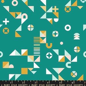 May include: Teal fabric with a geometric pattern in white, gold, and pink. The pattern includes circles, squares, triangles, and stars. The fabric has a repeating pattern.