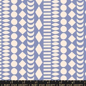 May include: A blue and white geometric pattern fabric with a repeating design of circles, diamonds, crescents, and rectangles. The fabric is from Ruby Star Society.
