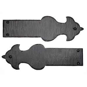 May include: Black metal hinges with a decorative, ornate design. The hinges are made of cast iron and have a textured surface.