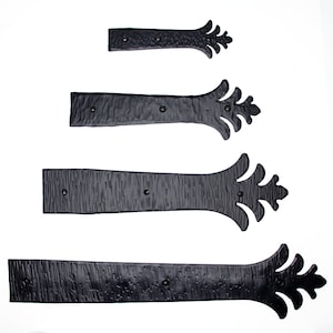 May include: A handmade, wooden serving tray with a natural finish. The tray features a rectangular shape with rounded corners and raised edges. It is designed for serving food and drinks. The tray measures approximately 30 cm long, 20 cm wide, and 5 cm high.