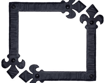 May include: Black metal corner brackets with a decorative fleur-de-lis design. The brackets are designed to be used for framing or decorative purposes.