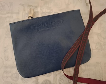 Penhaligon's of London: Make Up Bag - Cosmetics Purse - Dark Blue Leather - Zip Closure With Perfume Bottle Charm Attached- New Unused