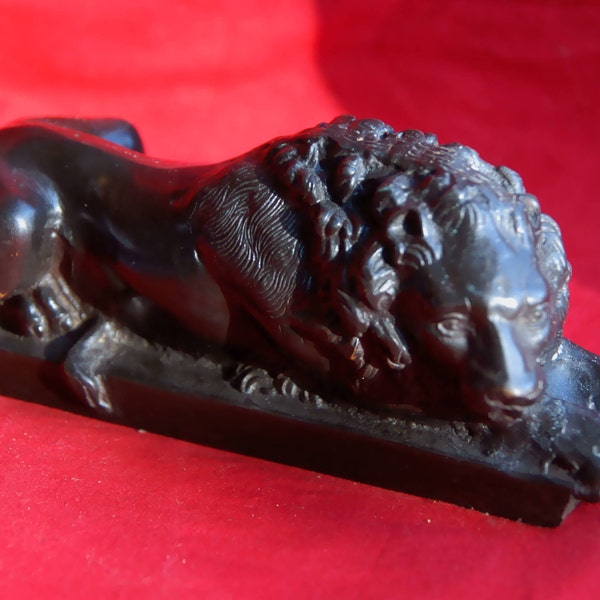 Beautiful antique lion bronze sculpture with a dark brown patina