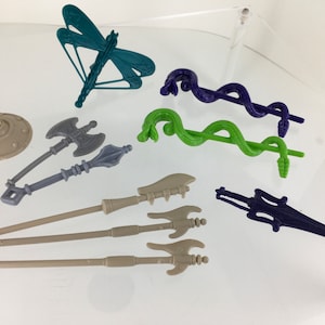 Masters Of the Universe Weapons. An Assortment of 1980’s Vintage MOTU Accesories.