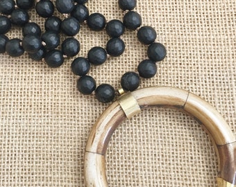 Matte Onyx knotted necklace with brown ox bone horn