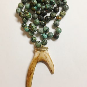 Knotted African Turquoise Necklace with a Brown Ox Bone Flat Antler image 1