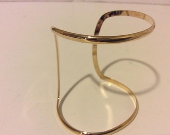 Sweet gold colored cuff bracelet