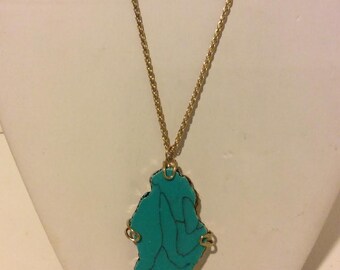 Turquoise blue and gold colored bedrock long necklace