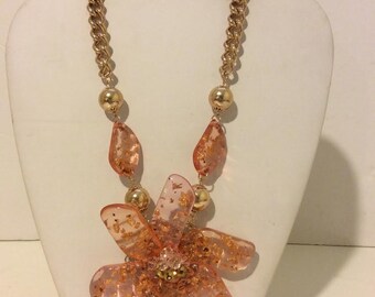 Extra chunky pink and gold resin flower statement necklace