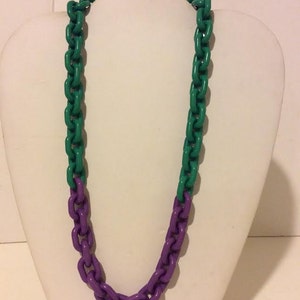 Short green and purple fun resin and plastic link necklace