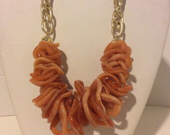 Chunky orange and gold resin statement necklace