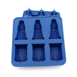 May include: Blue silicone ice cube tray with six molds shaped like Daleks from the Doctor Who television series.