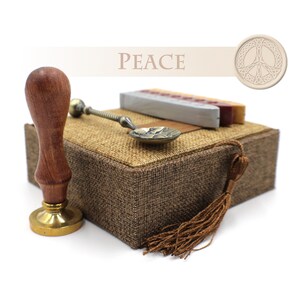 Sello con el símbolo de la paz adornado: juego o kit de regalo de lacre