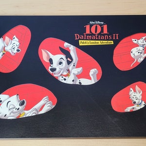 101 Dalmations II Patch's London Adventure Disney Store Exclusive Commemorative Lithograph Portfolio Set of 4, 14 x 11. Tri-Fold Portfolio image 1