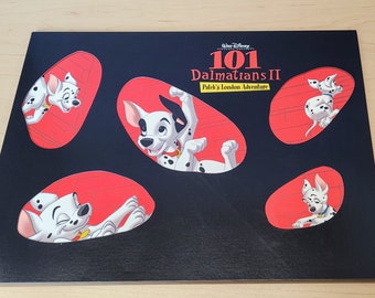 101 Dalmations II Patch's London Adventure Disney Store Exclusive Commemorative Lithograph Portfolio Set of 4, 14 x 11. Tri-Fold Portfolio