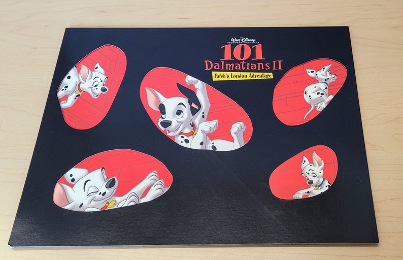 101 Dalmations II Patch's London Adventure Disney Store Exclusive Commemorative Lithograph Portfolio Set of 4, 14 x 11. Tri-Fold Portfolio image 1
