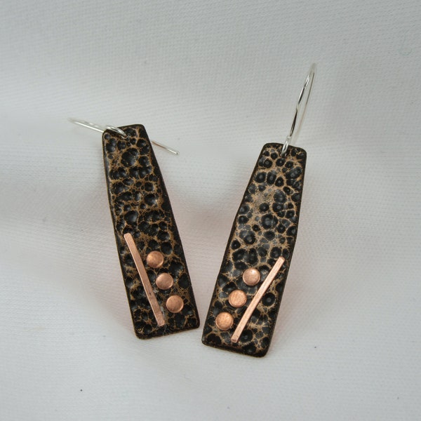 Earrings: textured black and cooper with copper accents; quasi rectangle; drop length 1.25 inches; PE23011 Carolyn Heineman