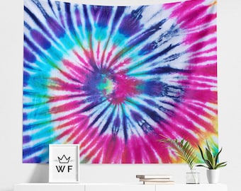 May include: A rectangular wall tapestry featuring a vibrant tie-dye spiral pattern in shades of hot pink, bright blue, deep purple, and white. The design radiates from a central point, creating a bold, colorful display of saturated fabric.