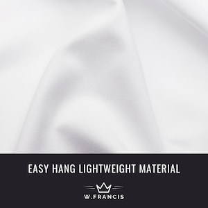 May include: White fabric with a smooth texture, showing the drape and flow of the material. The text "EASY HANG LIGHTWEIGHT MATERIAL" is displayed at the bottom of the image, with a crown logo and the text "W.FRANCIS" below it.