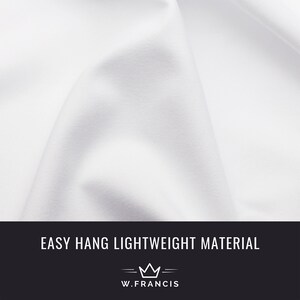 May include: White fabric with a smooth, wrinkle-free texture. The text "EASY HANG LIGHTWEIGHT MATERIAL" is displayed at the bottom of the image, with a crown and the text "W.FRANCIS" below it.