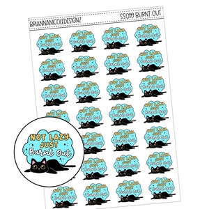 May include: A sheet of 24 round stickers featuring a black cat with the text "Not Lazy Just Burnt Out". The stickers are blue with gold text and are perfect for adding a touch of humor to your planner, laptop, or water bottle.