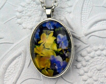 purple and yellow pansy photo necklace in silver setting