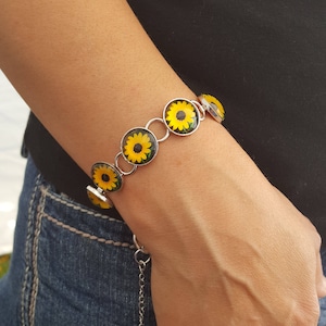 adjustable sunflower photo bracelet in silver setting with glass cabochons image 1