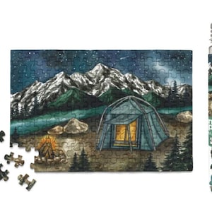 May include: A micro puzzle depicting a camping scene with a tent, campfire, and mountains under a starry night sky. The puzzle is partially assembled, with some pieces separate. The puzzle is packaged in a clear tube.