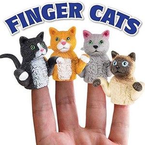 May include: Four cat finger puppets in black and white, orange and white, grey, and tan are displayed on fingers. The text "FINGER CATS" is arched above the puppets in blue and white.