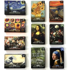 Mini Masterpiece Jigsaw Puzzle in a Matchbox - 50 piece.  Assorted famous paintings