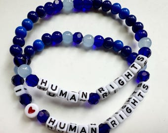 Human Rights (2 Styles) + FREE Mini Stacker