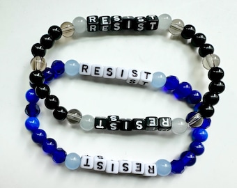 RESIST (2 Styles) + FREE Mini Stacker