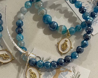 Blue beaded bracelet with white enamel Mary medal