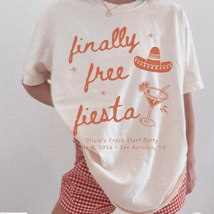 Matching Divorce Party Comfort Colors Shirts, Finally Free Fiesta  - Freedom Fiesta Crew, in a handwritten font with mexican hat, margarita cocktail, doodle stars and personalized with name and party details